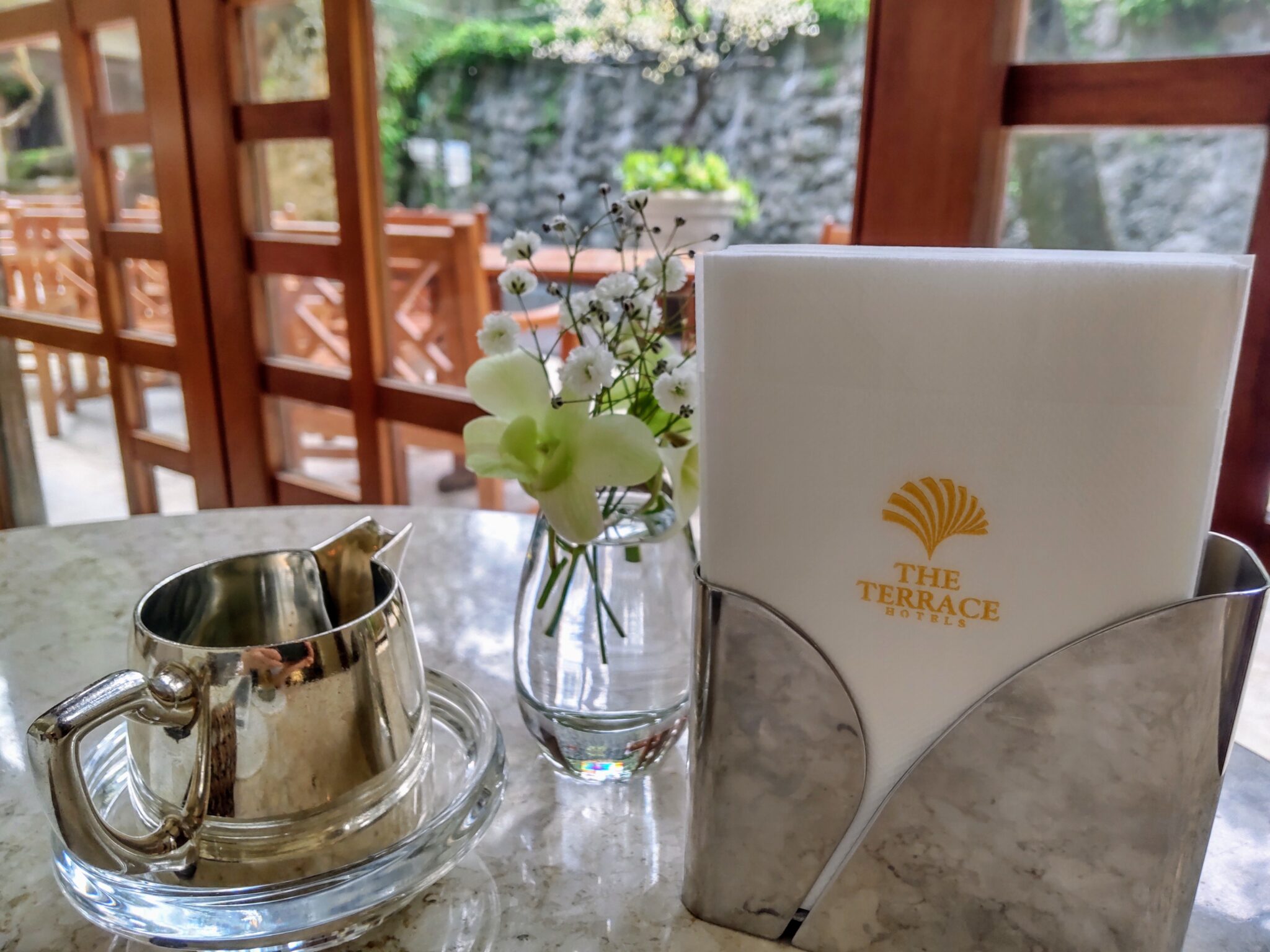 Fresh flowers on the café table