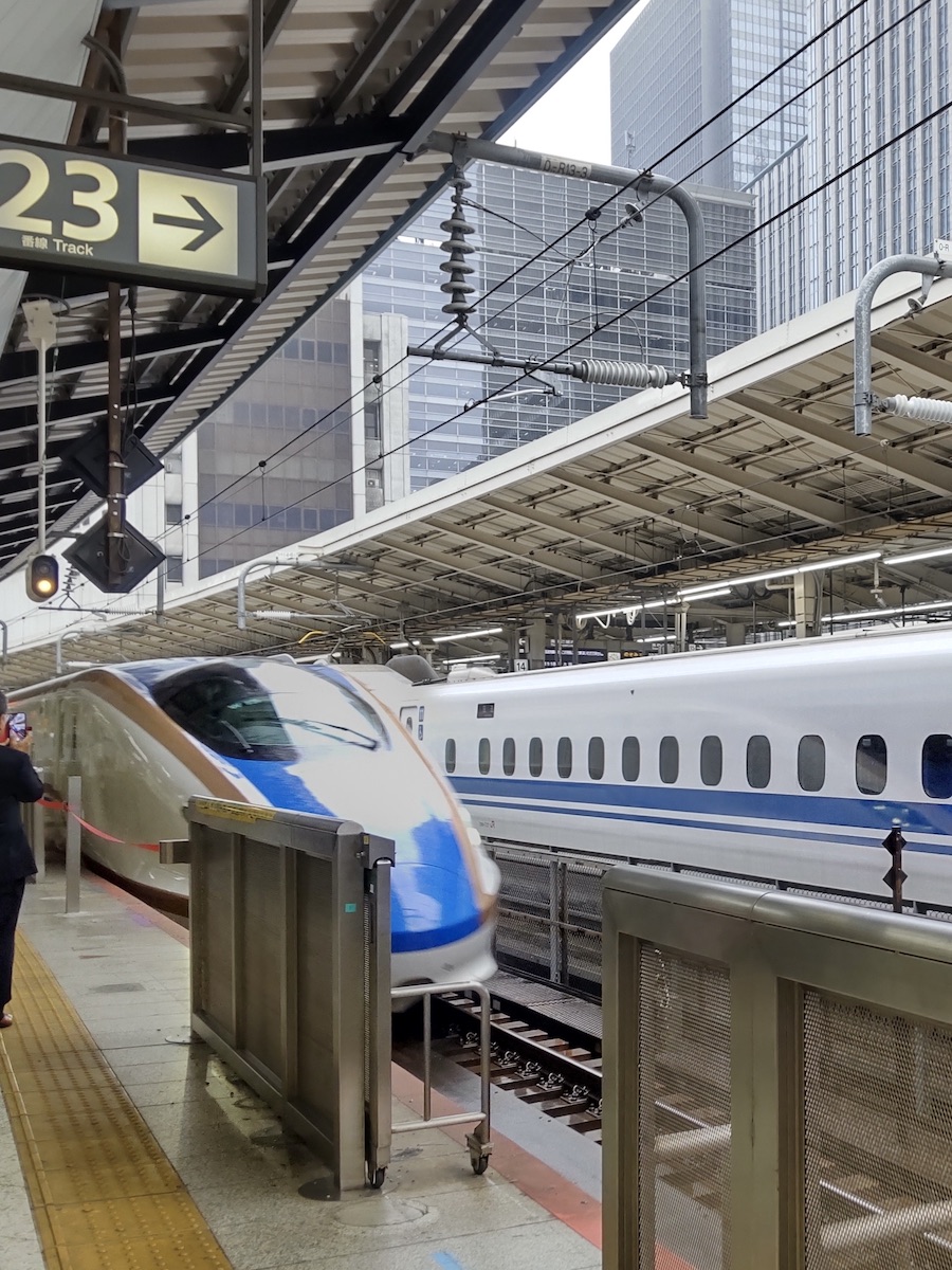 A Shinkansen arriving at Tokyo Station platform
