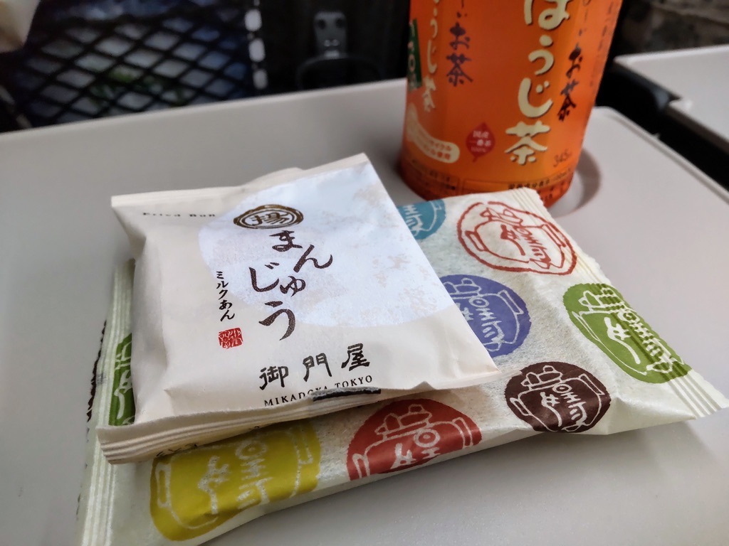 Japanese snacks on the train table in a Shinkansen