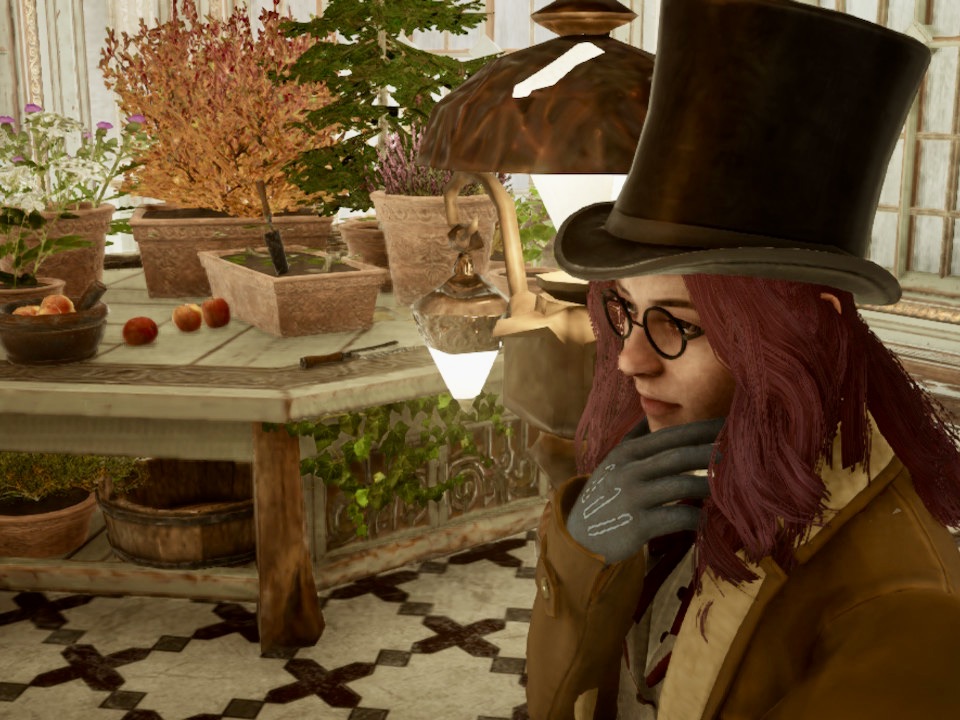 Emily indoors wearing a black top hat, leather coat, and round glasses.