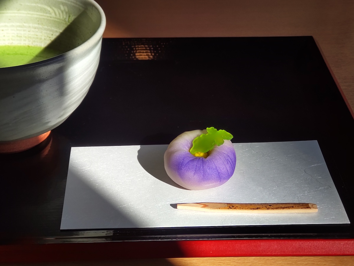 Japanese sweets inspired by purple chrysanthemums that are still in bloom from late autumn to early winter, served with matcha.
