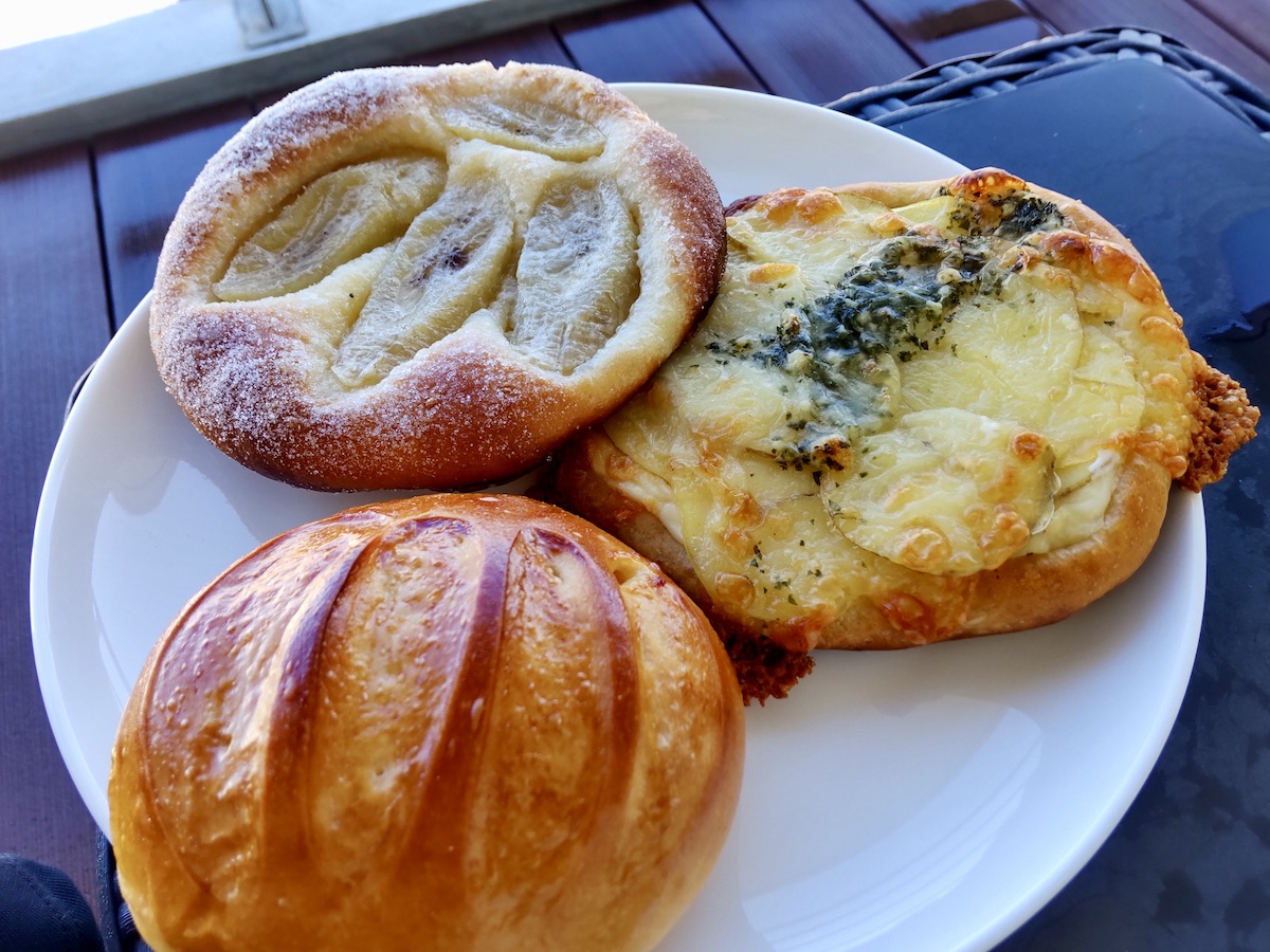Three types of assorted pastries served on a plate