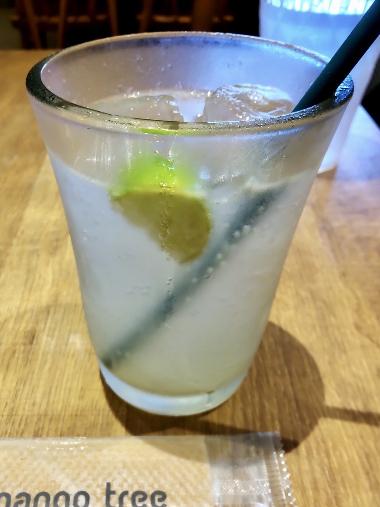 A glass with soda and lime